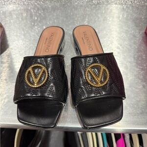 Valentino Black Mules with Gold Emblem